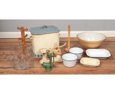 An assortment of kitchenalia, to include enamel dishes, bread bin, egg basket and scales etc.  