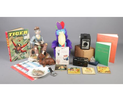 A box of miscellaneous. Includes Sekonda X-Pose watch, cameras, Cadbury's Parrot, ceramic advertising coasters, Sheffield Uni