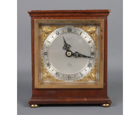A mahogany cased Elliott mantle clock, with Roman Numeral dial inscribed 'Pailsthorp, Grimsby'. Height: 15cm.  Running.