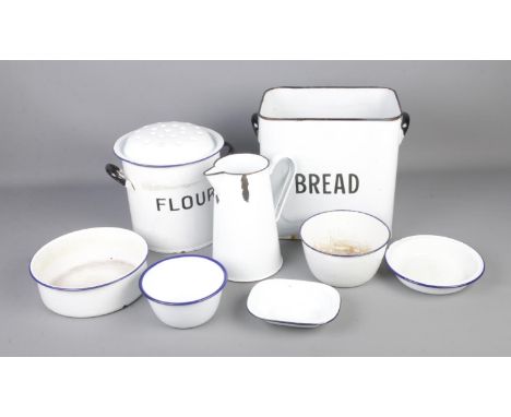 A collection of enamel kitchen items to include bread bin, flour bin, milk jug, etc.  