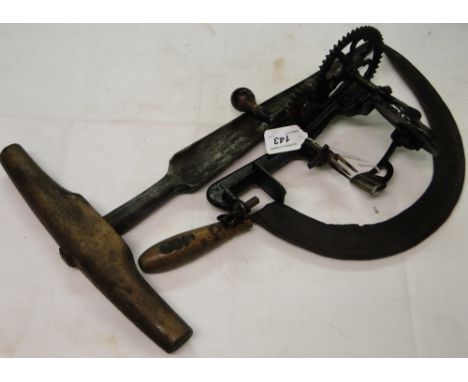 Three vintage hand tools.