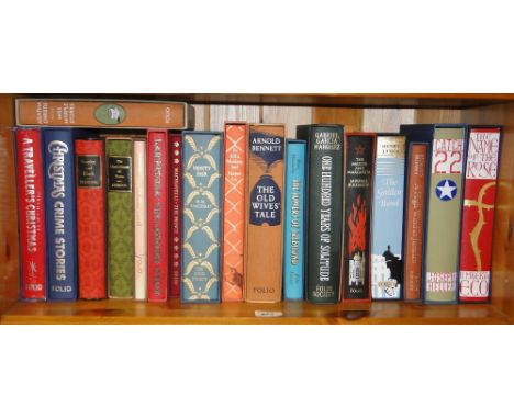 A shelf of folio books including Joseph Heller & Arnold Bennett