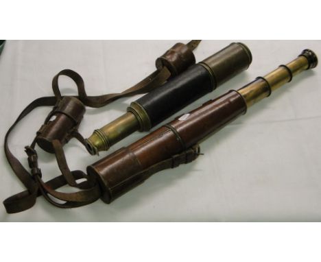 A leather cased military telescope by Broadhurst, Clarkeson & Co., 1916 and another telescope.
