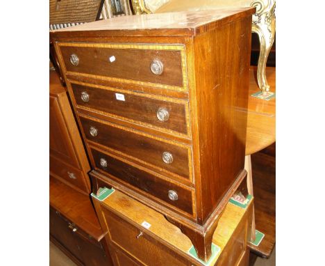 A mahogany 4-drawer chest on bracket feet.