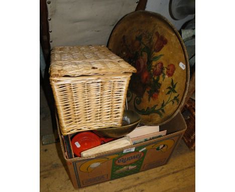 A small hamper and a box of various items.