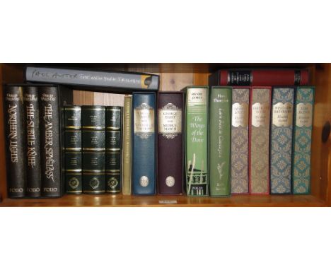 A shelf of folio books including George Eliot & Elizabeth Gaskell