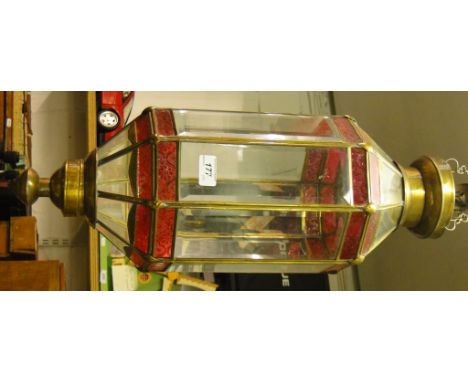 A Moroccan style brass framed hanging lantern