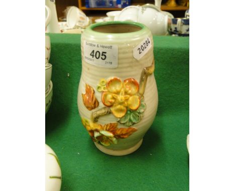 A Clarice Cliff Newport Pottery vase with moulded and painted blossom decoration.
