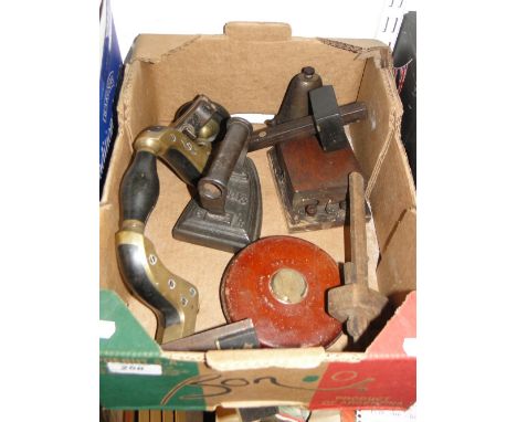 Flat iron, surveyors tape, tools, etc