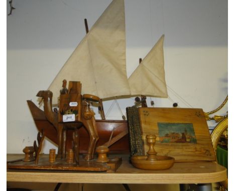 Camel figure desk stand, photo album, model sailing boat & a chamber stick