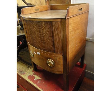 A Georgian mahogany tray top commode, with tambour front and drawer under.