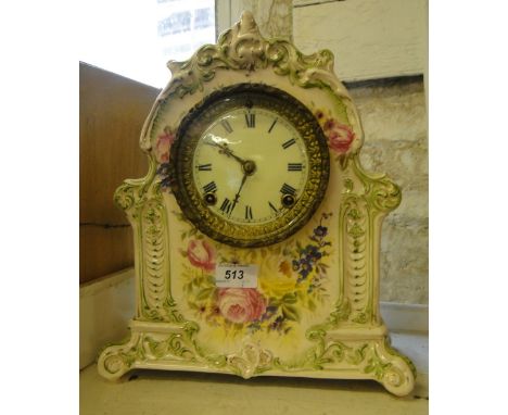 Ceramic cased mantel clock with painted floral decoration and a Royal Doulton vase.