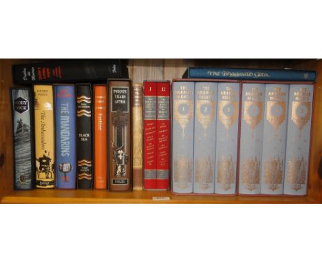 A shelf of folio books including the Arabian Nights, & Henry James