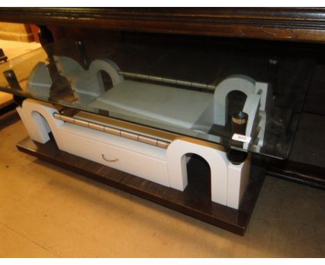 A Post-Modern architectural design coffee table, with glass top, in the manner of Terry Farrell
