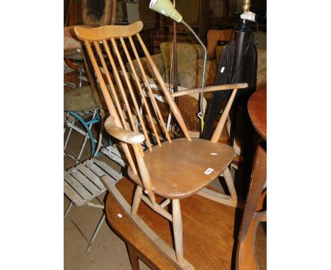 An Ercol stick back rocking chair.