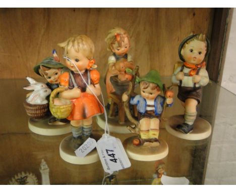 5 Goebel's Hummel figures.