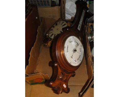 Carved oak barometer & a clock face
