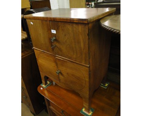A 18th century mahogany 4-door cabinet on bracket feet.