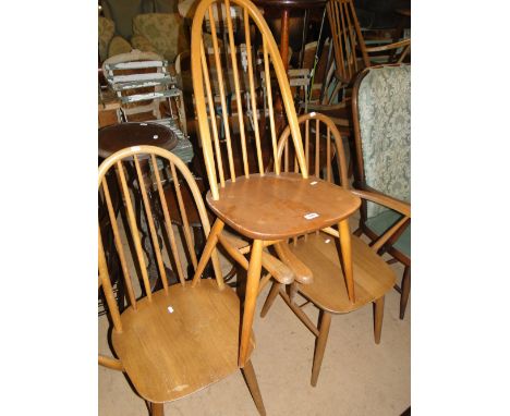 Pair of Ercol stick back elbow chairs and a matching side chair.