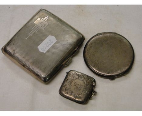 Engine turned silver cigarette box, silver compact and an engraved silver vesta, 5.6oz