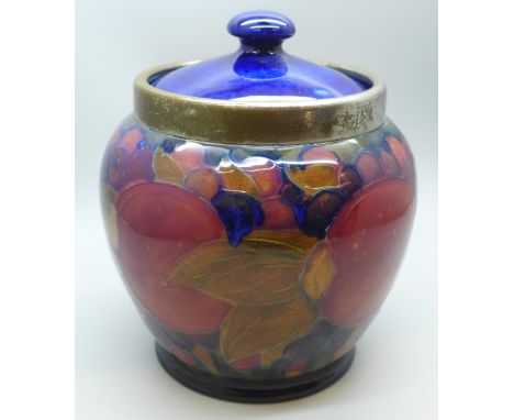 A Moorcroft pomegranate caddy, impressed mark M122 Y, painted signature, a/f, large crack, 14.5cm