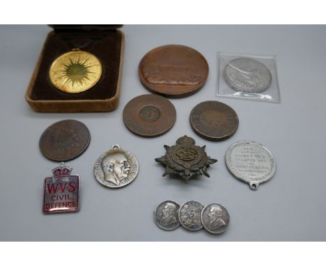 A 925 silver gilt medallion, 25.7g, a Robert Stephenson bronze medallion, a/f, other medallions, a 1935 crown, a George IV Hi