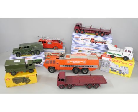A collection of Dinky original model vehicles to include a Turntable Fire Escape, Medium Artillery Tractor, Army Covered Wago