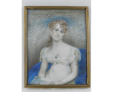 Late 19th / early 20th century Continental school, portrait study of a lady, oil on ivory. H.11cm W.8.5cm