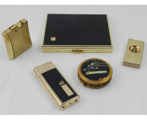 A Colibri cigarette case and lighter, together with associated cigar cutter and portable ash tray. 