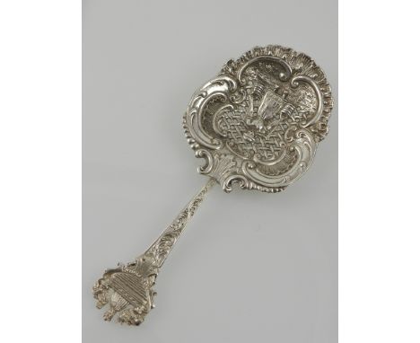 An unusual Edwardian caddy spoon, pierced and embossed decorated with a scene depicting Edward III, hallmarked Birmingham 190