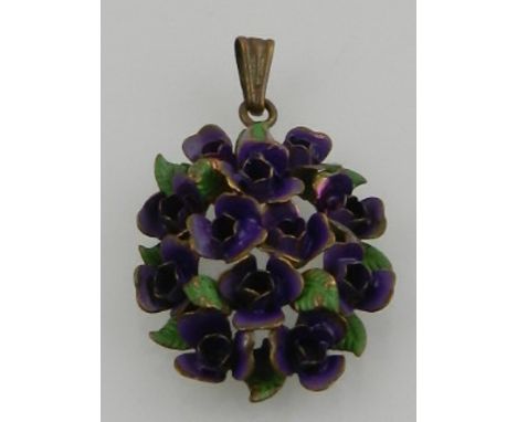 A Victorian enamel floral pendant, in the form of a cluster of violets amongst leaves. 
