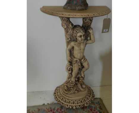 A 20th century carved pine demi-lune console table, the base in the form of a boy in a tree. H.81cm W.51cm