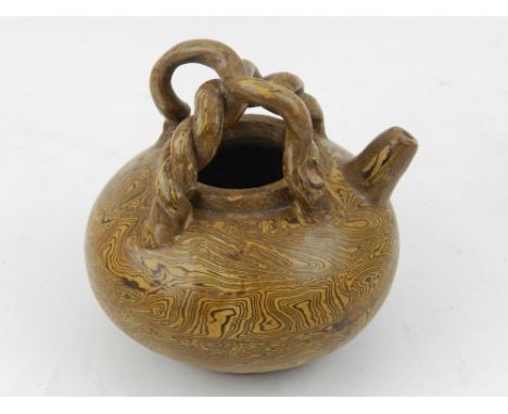 A Chinese Jiao Tai teapot, having twisted handles. H.10cm