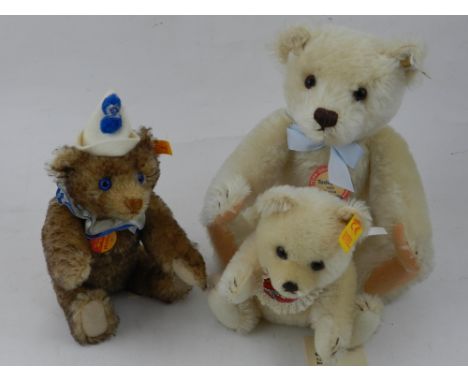 A Steiff '1953 Replica' bear, a Steiff 'Baby 16 bear,and a Steiff 'Teddy Clown 16' bear.