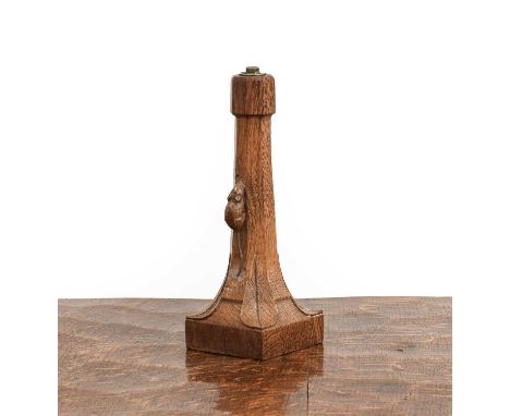 Workshop of Robert Mouseman Thompson (Kilburn): An English Oak Table Lamp, octagonal column on a square base, with carved mou