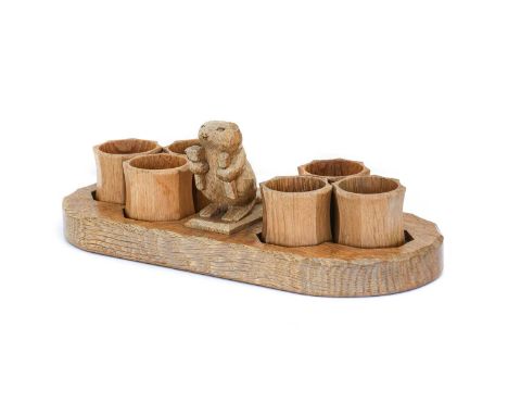 Beaverman: Colin Almack (1930-1996) (Sutton-under-Whitestonecliffe): An Oak Napkin Ring Stand, with central carved standing b