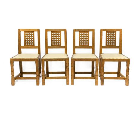 Workshop of Robert Mouseman Thompson (Kilburn): A Set of Four English Oak High Lattice Back Dining Chairs, 2012, cream leathe