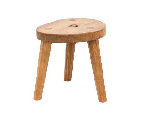 Wrenman: A Bob Hunter (Thirlby): An English Oak Calf Stool, on three octagonal legs, with recessed carved wren trademark,30cm