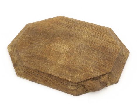 Workshop of Robert Mouseman Thompson (Kilburn): An English Oak Bread Board, of octagonal form, with carved mouse trademark,30