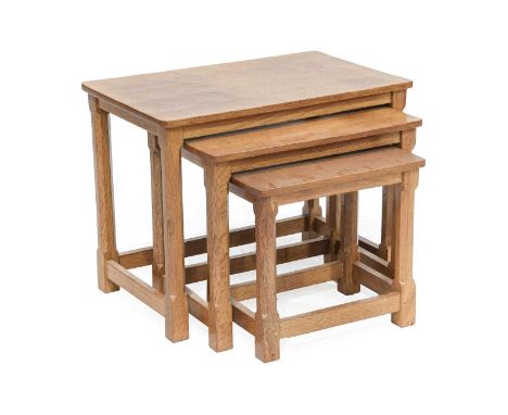 Workshop of Robert Mouseman Thompson (Kilburn): An English Oak Nest of Three Tables, adzed rectangular tops, on four octagona