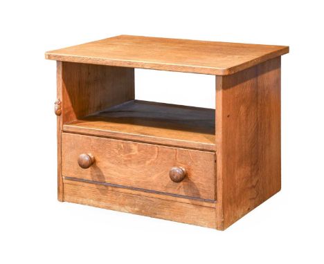 Workshop of Robert Mouseman Thompson (Kilburn): An English Oak Telephone Table, flat top, above an open compartment, above a 