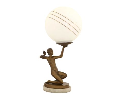 An Art Deco Gilt Spelter Figural Table Lamp, modelled as a semi-nude female kneeling, arm outstretched holding a white and gi