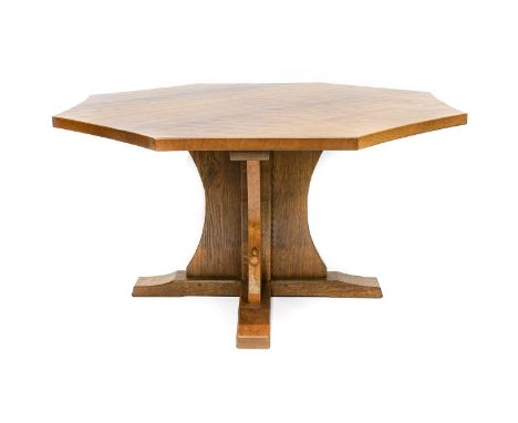 Workshop of Robert Mouseman Thompson (Kilburn): An English Oak 4'10" Octagonal Dining Table, post 1971, adzed top, on a cruci