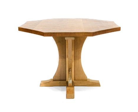 Workshop of Robert Mouseman Thompson (Kilburn): An English Oak 3'9" Octagonal Dining Table, post 1971, adzed top, on a crucif