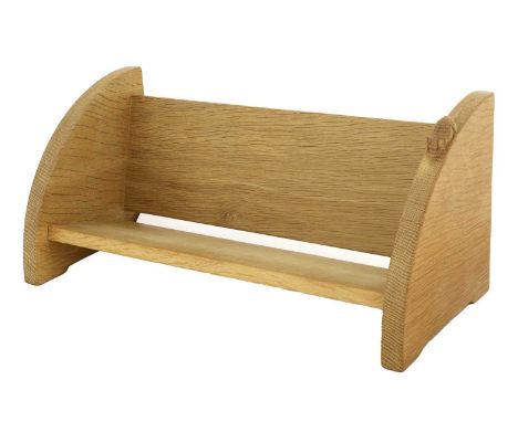 Workshop of Robert Mouseman Thompson (Kilburn): An English Oak Book Trough, with carved mouse trademark, 46cm wideIn good ord