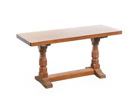 Workshop of Robert Mouseman Thompson (Kilburn): An English Oak 3ft Refectory Coffee Table, the rectangular adzed top on two o