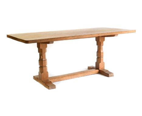 Workshop of Robert Mouseman Thompson (Kilburn): An English Oak 6ft Refectory Dining Table, the adzed rectangular top on two o