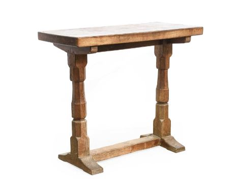 Robert Mouseman Thompson (1876-1955): An English Oak Side Table, 1930s, 2" thick adzed rectangular top, on two octagonal legs