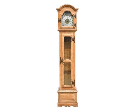 Yorkshire School: An Oak Longcase Clock, arched top, brass dial with silver chapter ring, double weight driven movement, the 