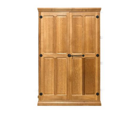 Beaverman: Colin Almack (1930-1996) (Sutton-under-Whitestonecliffe): An Oak Panelled Wardrobe, doors with wrought iron handle